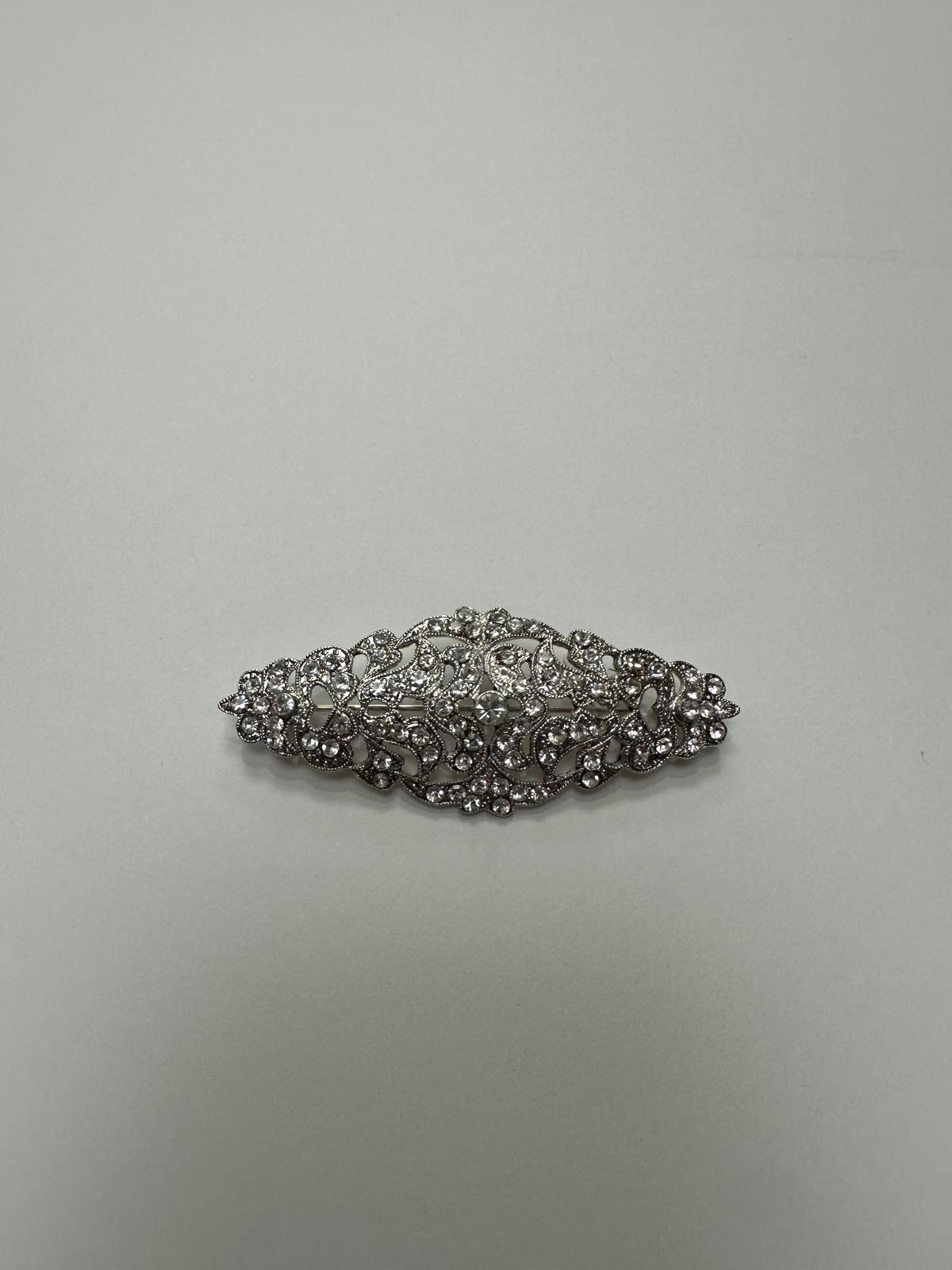 Broche rodio plateado. Modelo 1