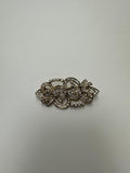 Broche rodio dorado. Modelo 14