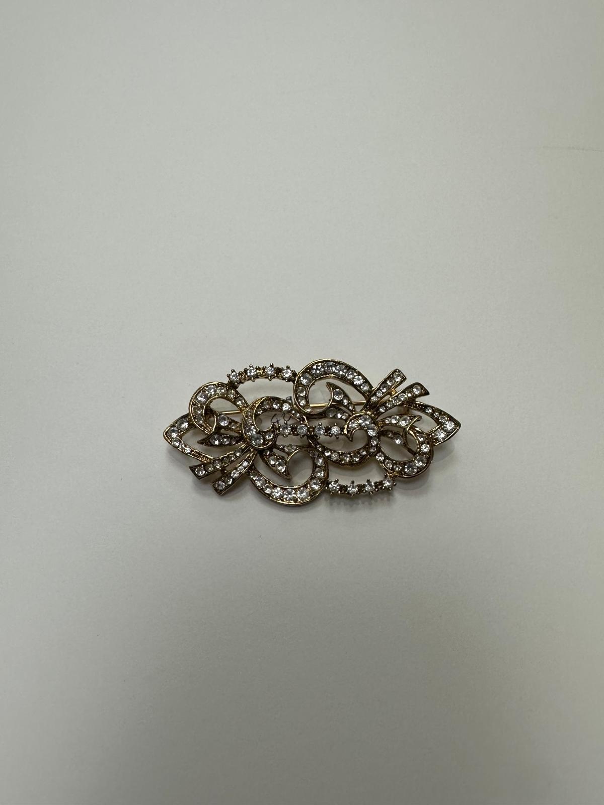 Broche rodio dorado. Modelo 14