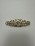 Broche rodio dorado. Modelo 16