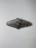 Broche rodio plateado. Modelo 7