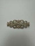 Broche rodio dorado. Modelo 17