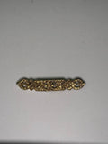 Broche rodio dorado. Modelo 18