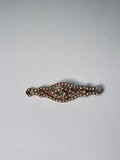 Broche rodio dorado. Modelo 20