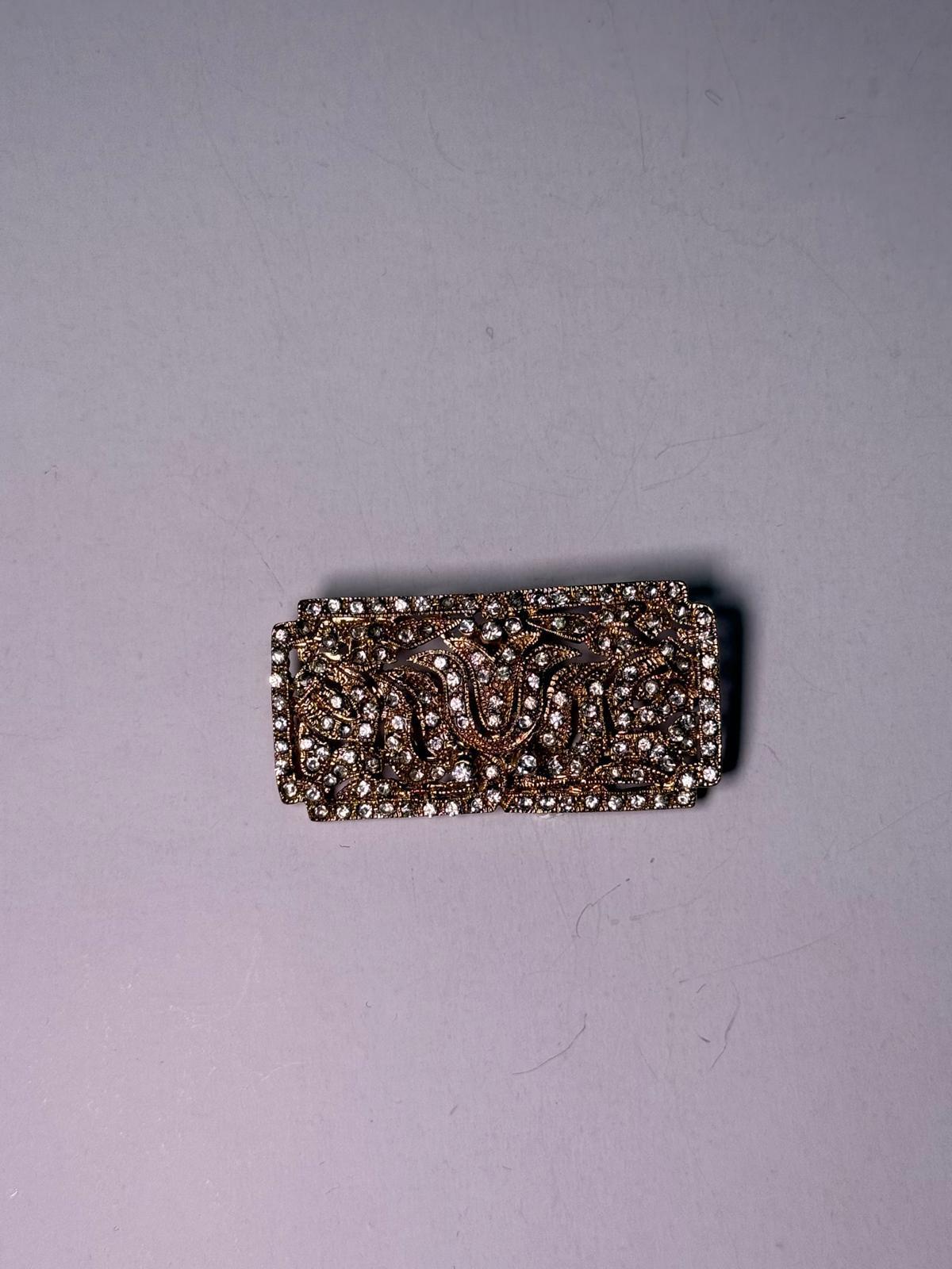 Broche rodio dorado. Modelo 22