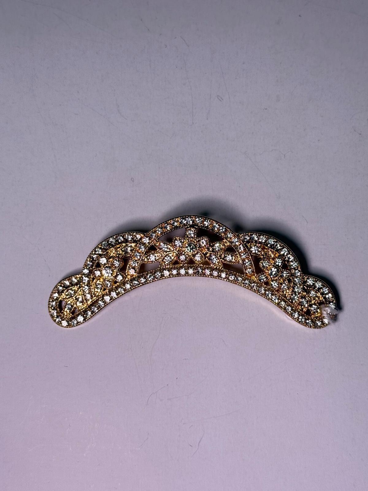 Broche rodio dorado. Modelo 26